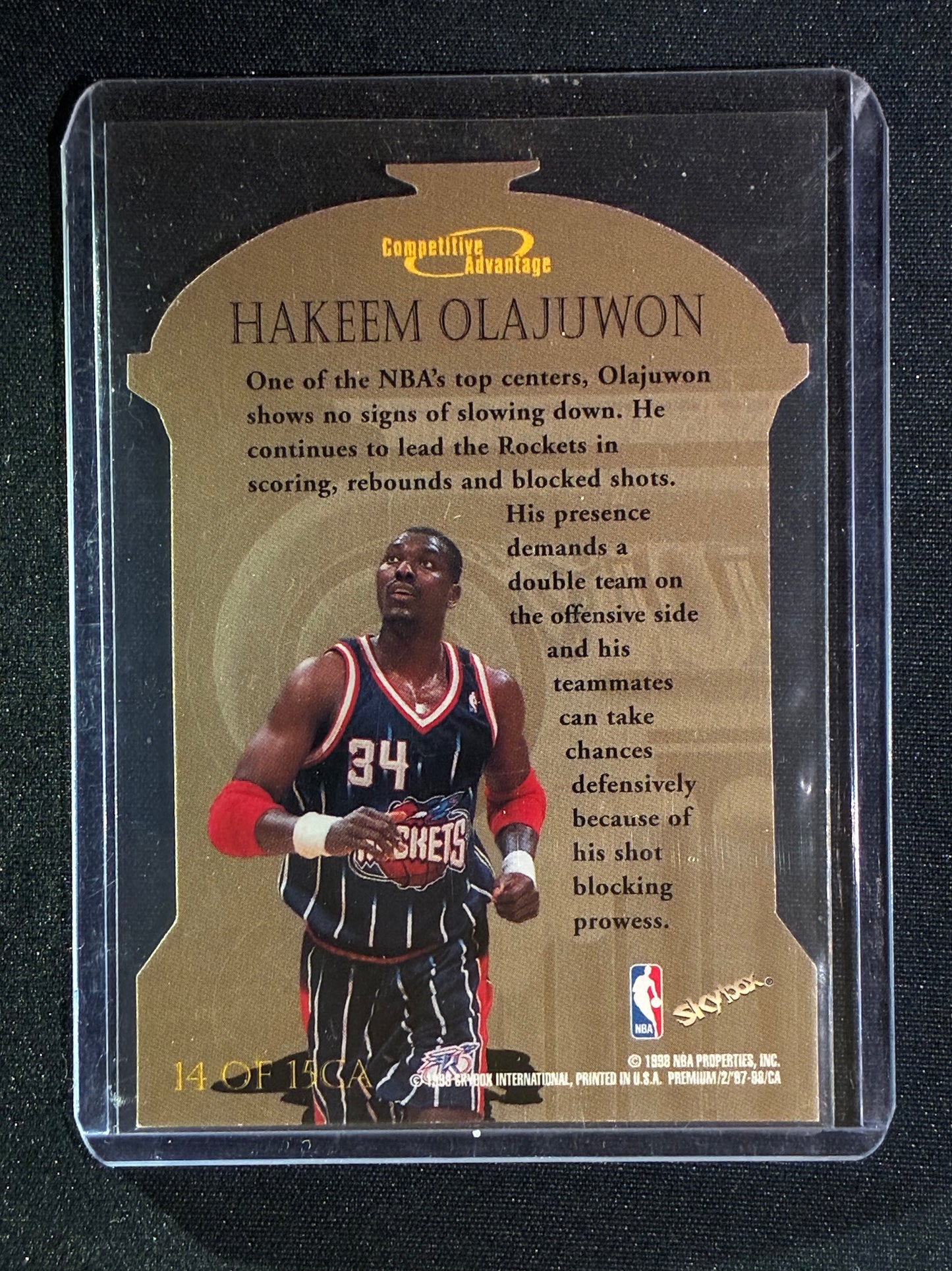 1997-98 Skybox Premium HAKEEM OLAJUWON Competitive Advantage Die-Cut #14